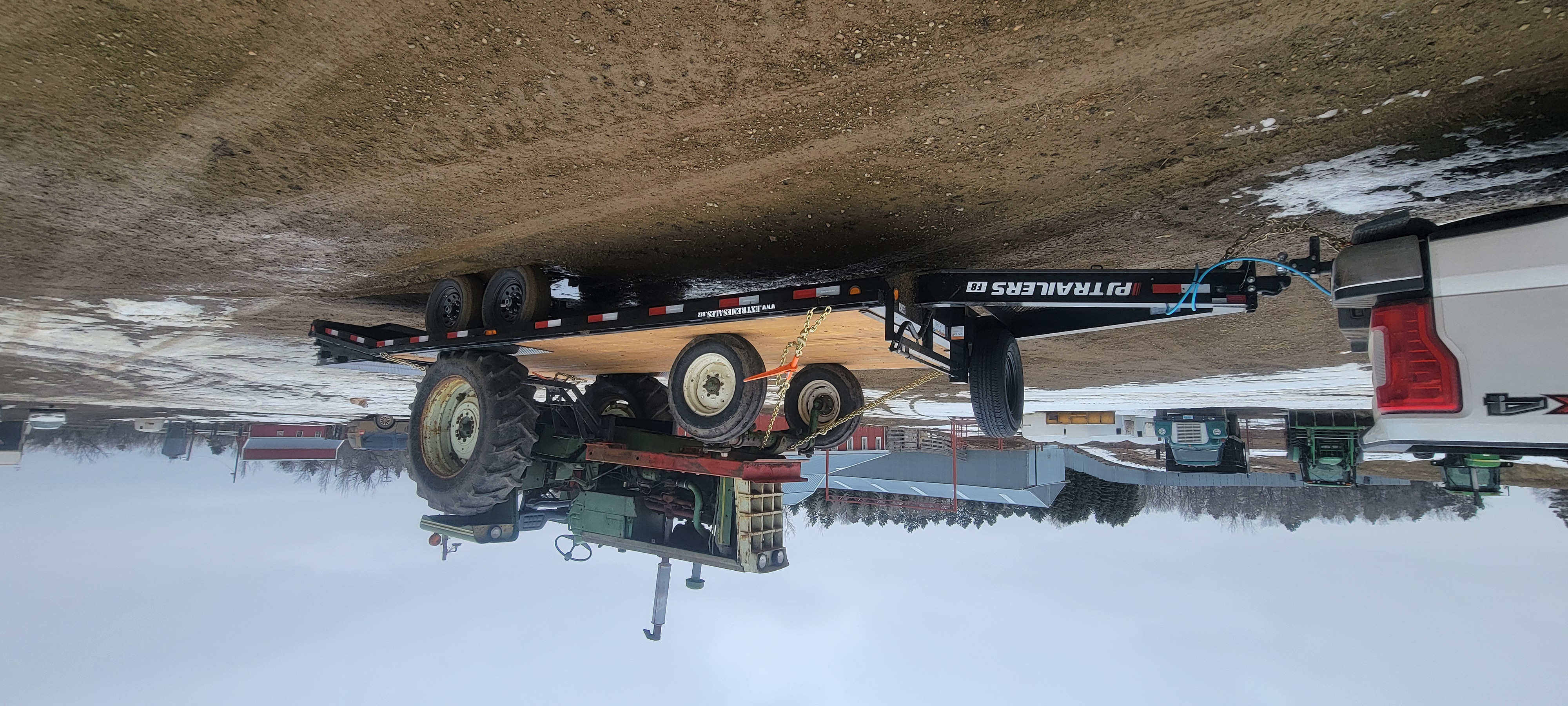 Equipment trailer rental Bismarck ND - heavy-duty deckover trailers for construction and machinery hauling